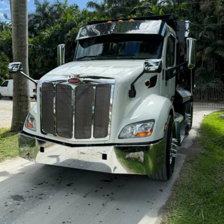 2022 PETERBILT  579 DUMP TRUCK TRI-AXLE STEEREABLE THIRD AXLE