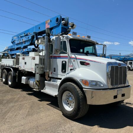2014 ALLIANCE CONCRETE PUMP 32 METER  MOUNTED ON A 2015 PETERBILT 348 CAPACITY 210 CUBIC YARDS PER HOUR