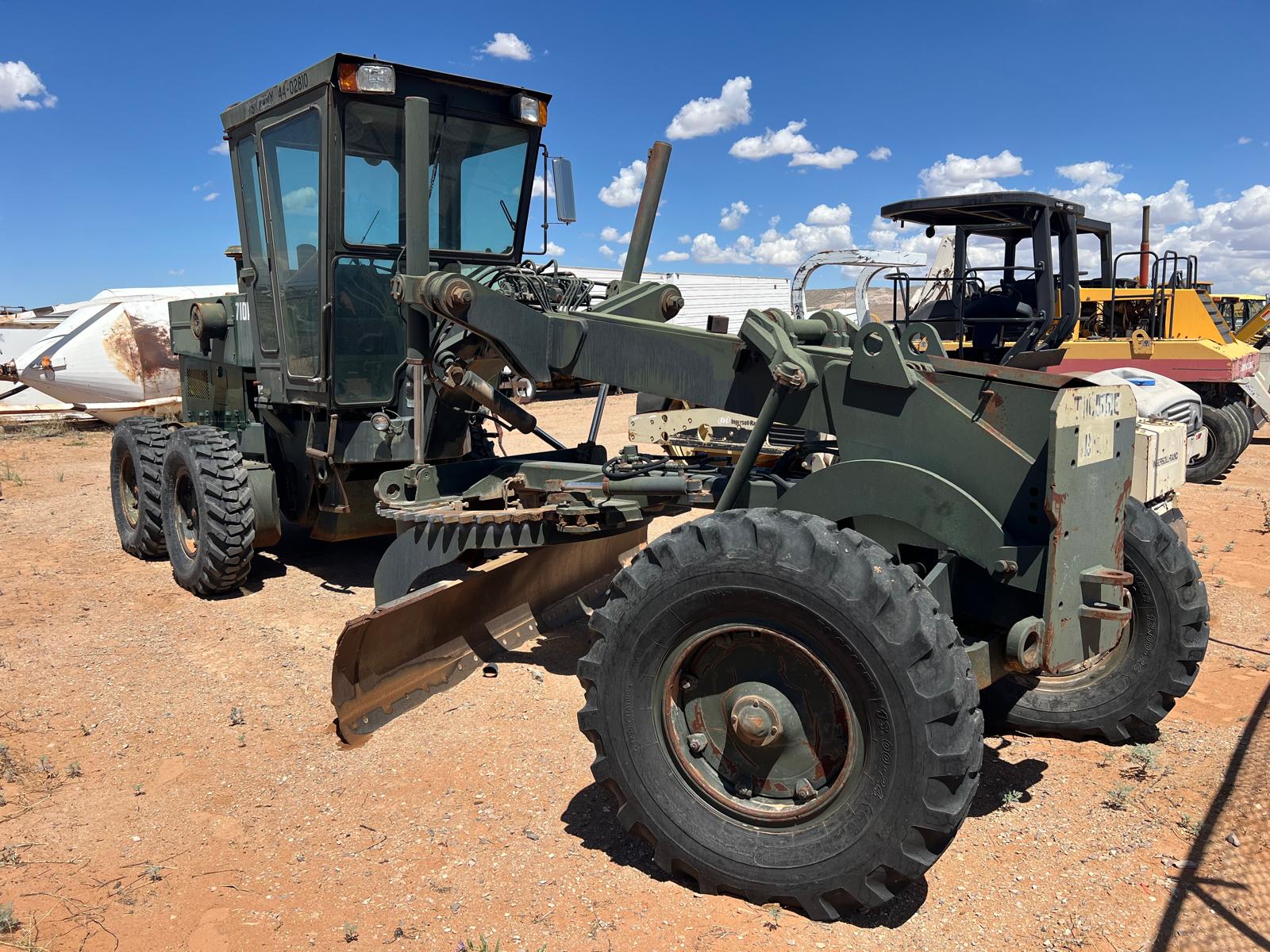 1988 CHAMPION 710A MOTOR GRADER  ENCLOSED CAB FRONT  EX GOVERNMENT UNIT U.S. NAVY