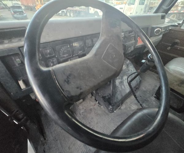 1990 INTERNATIONAL DT466 ROLL OFF 24FT W TARP 010