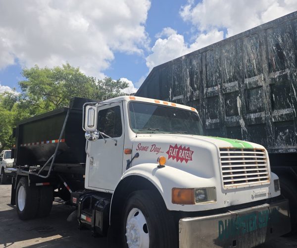 1998 INTERNATIONAL ROLL-OFF TRUCK WITH 12 FT BIN 001