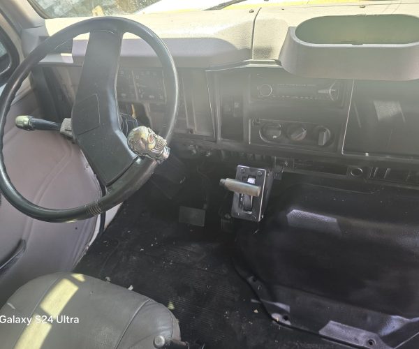 1998 INTERNATIONAL ROLL-OFF TRUCK WITH 12 FT BIN 010