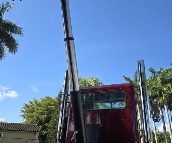 2005 PETERBILT 357 TRI AXLE DUMP TRUCK W STEERABLE THIRD AXLE FACTORY DOUBLE POWER STEERING 006