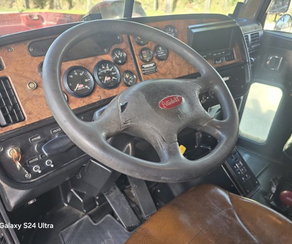 2005 PETERBILT 357 TRI AXLE DUMP TRUCK W STEERABLE THIRD AXLE FACTORY DOUBLE POWER STEERING 011