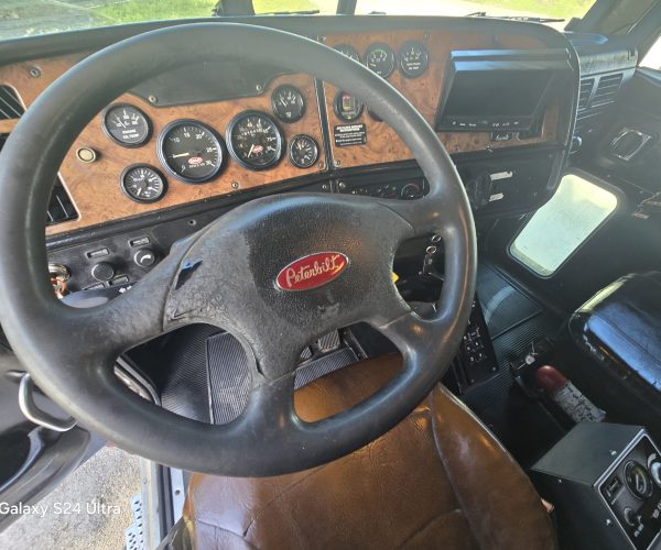 2005 PETERBILT 357 TRI AXLE DUMP TRUCK W STEERABLE THIRD AXLE FACTORY DOUBLE POWER STEERING 015