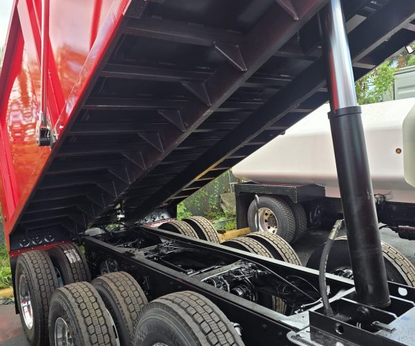 2022 PETERBILT 579 TRI-AXLE DUMP TRUCK WITH 100,000 LB HITCH 2 UNITS AVAILABLES 025